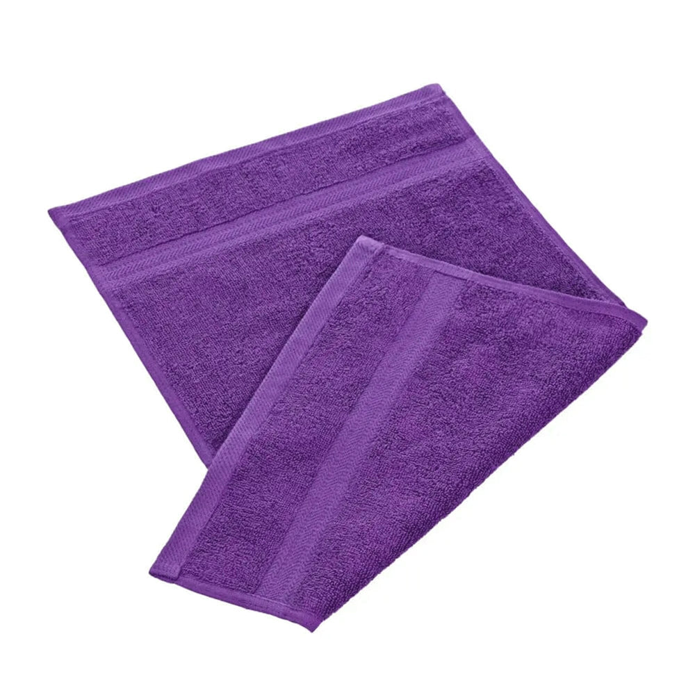 Purple egyptian cotton 550gsm manicure guest towel on white background