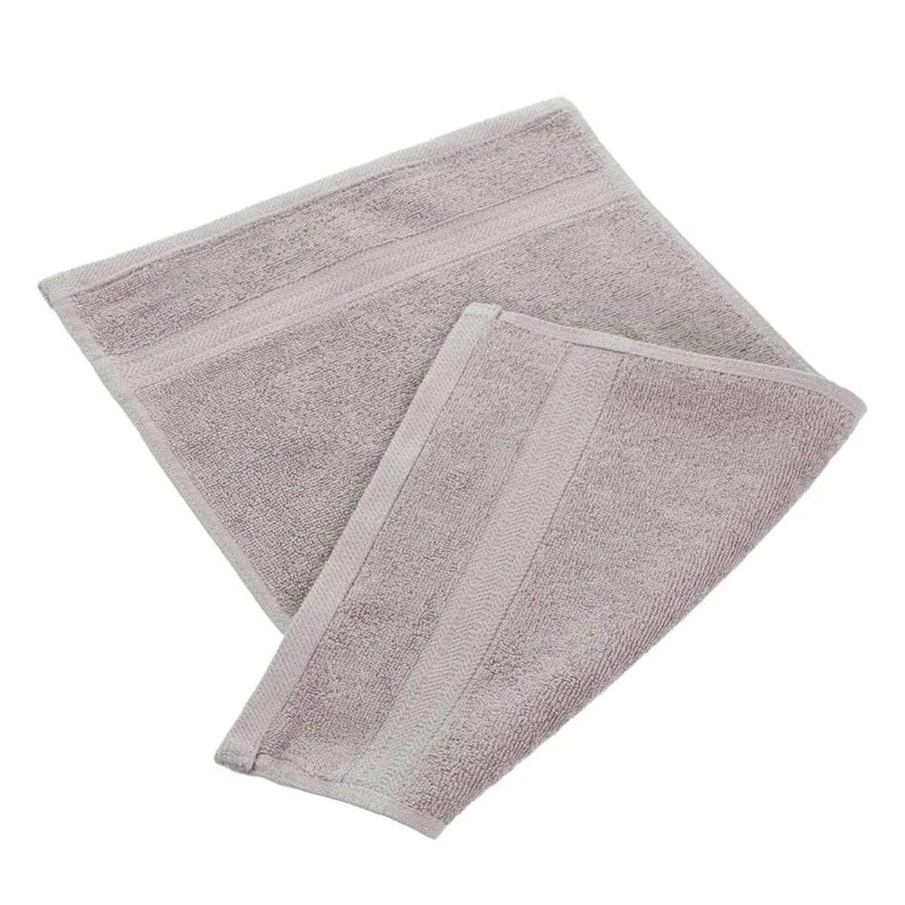 Natural egyptian cotton 550gsm manicure guest towel on white background