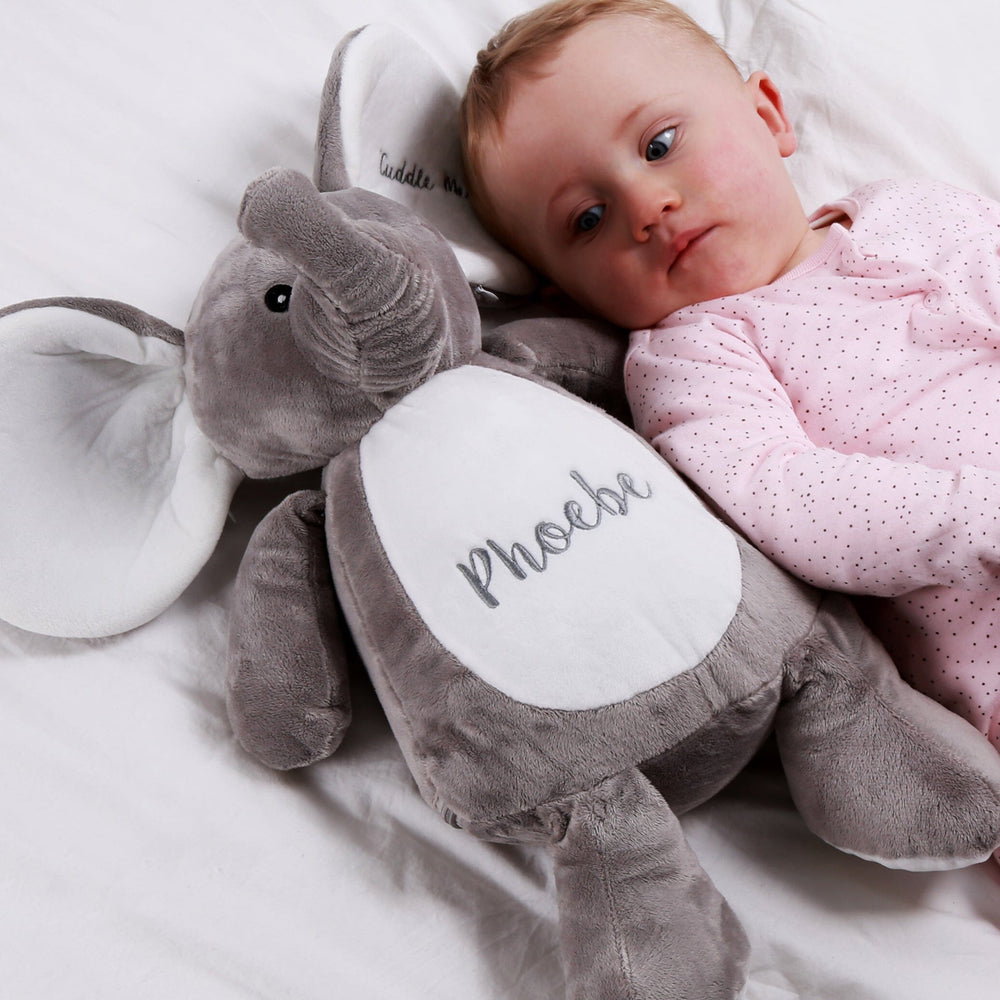 Personalised Cuddly Elephant Teddy lying next to a toddler