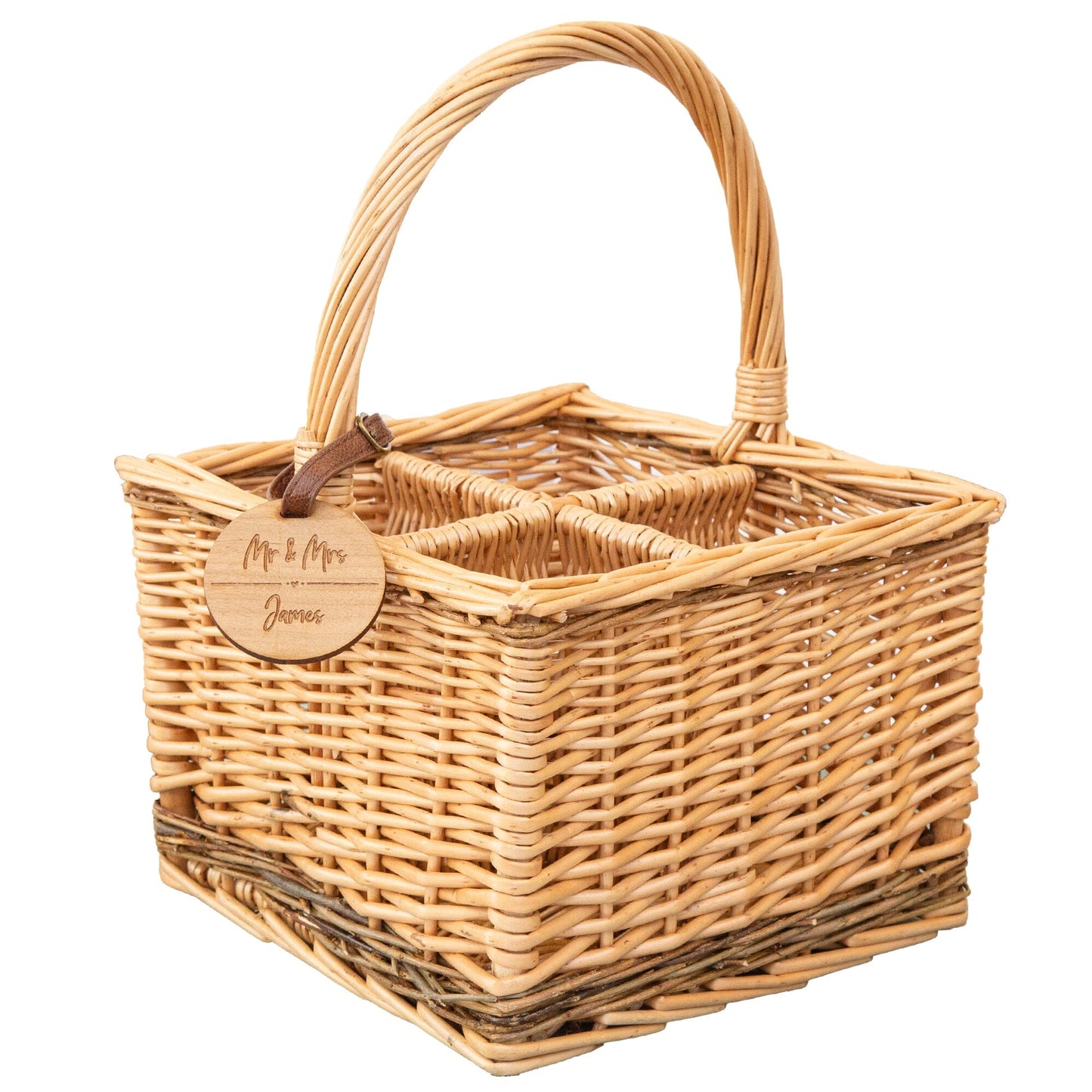 A personalised wicker wine carrier basket on a white backdrop featuring a personalised round cherry wood veneer tag