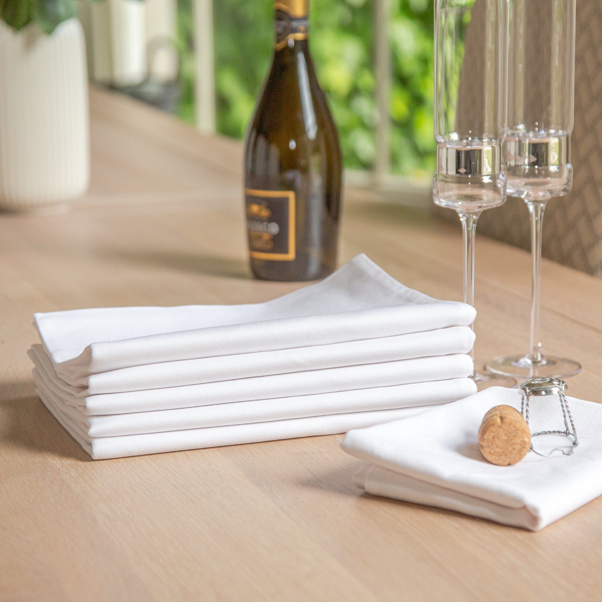 plain cotton tea towel in use at the dinner table