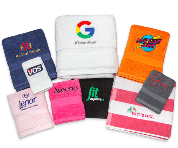 Mixture of embroidered towels with business logos