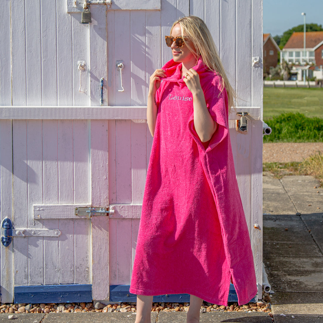 woman wearing personalised changing robe at the beach