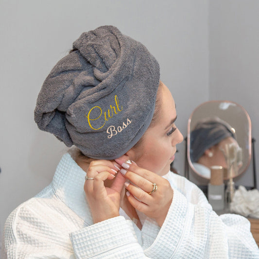 A female model wearing Slate Aztex Luxury Hair Turban Towel Curl Boss Logo 