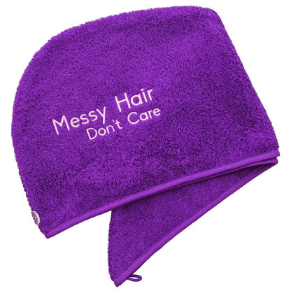 Purple Luxury Hair Towel with Messy Hair Don't Care Logo on a white backdrop