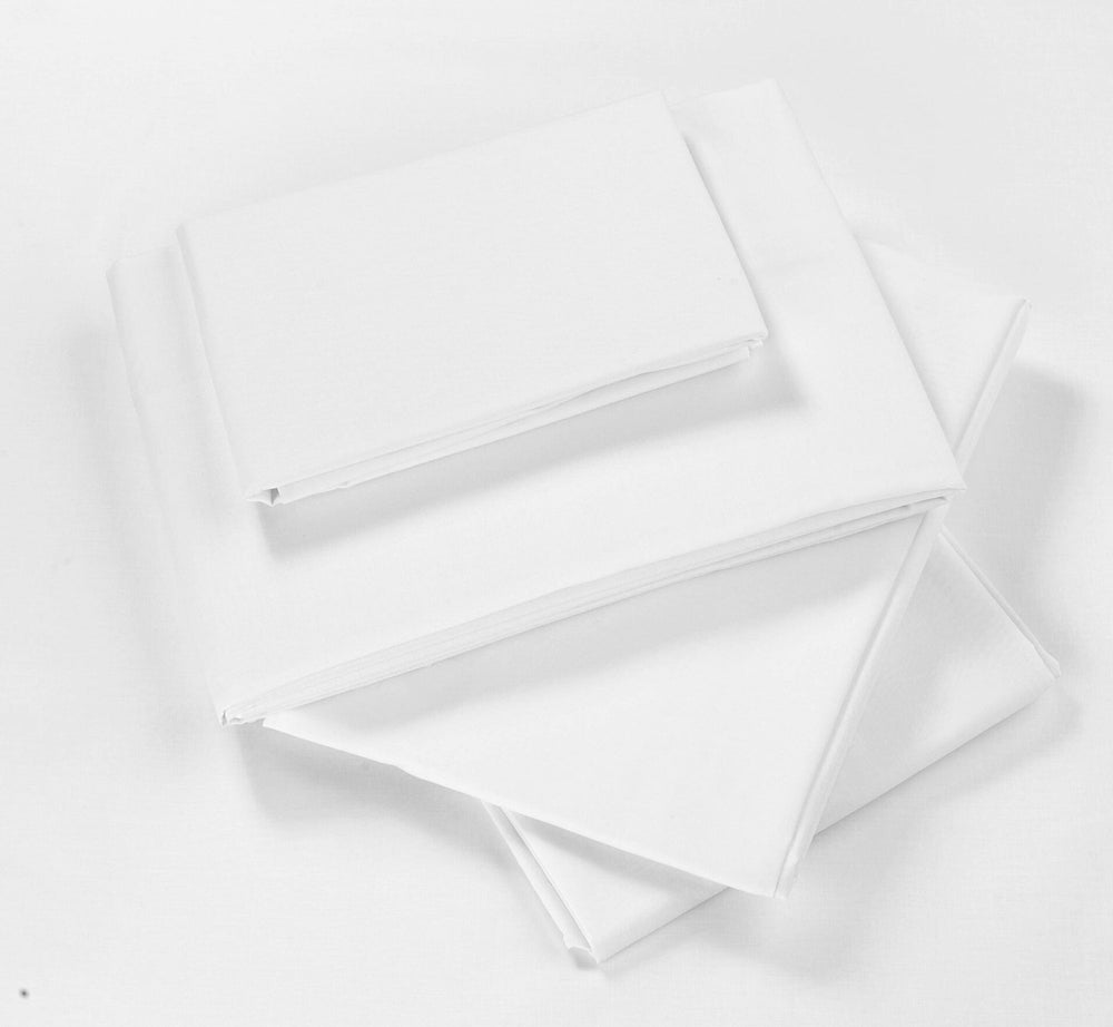 A stack of plain white folded sheets or fabric pieces on a white background.