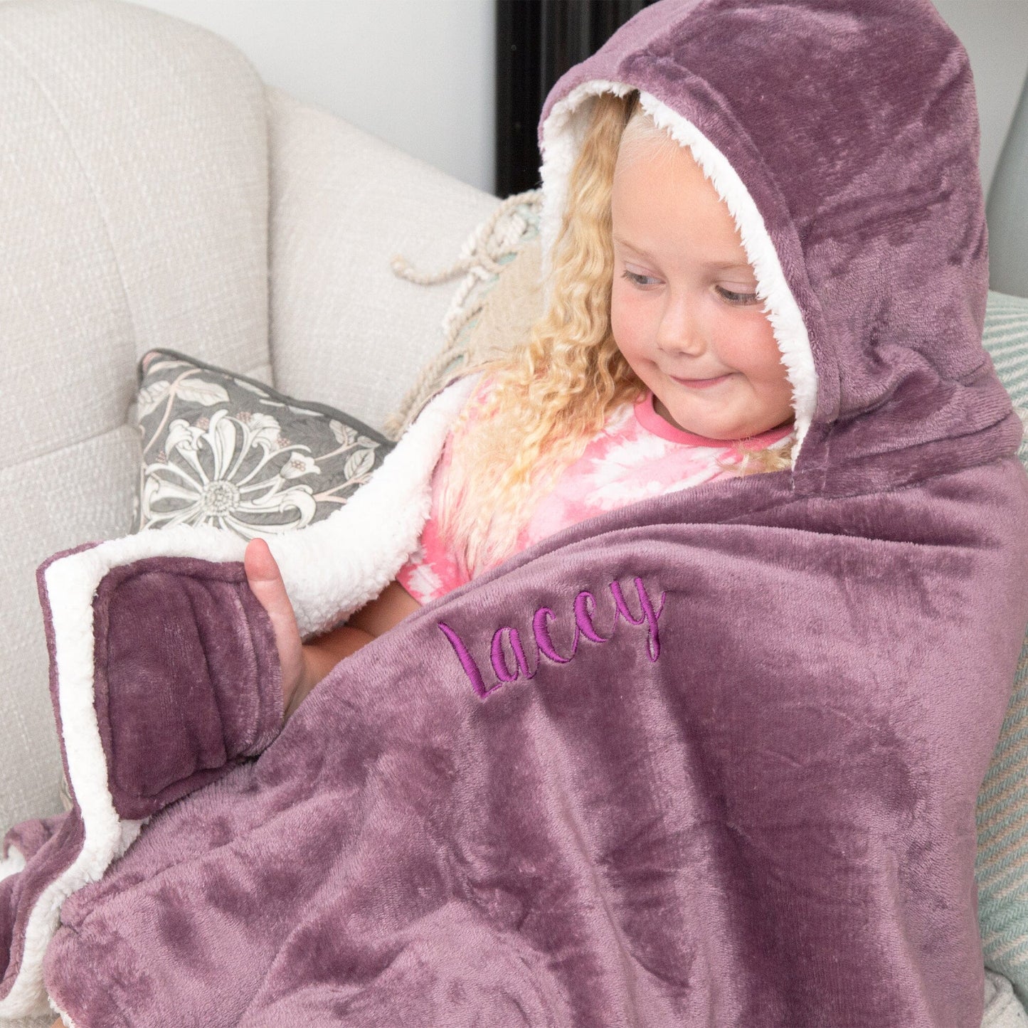 A kid wearing Personalised lavender Hooded Sherpa Blanket