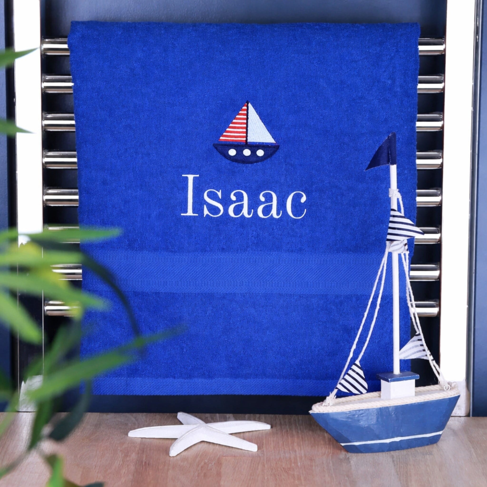 boys name on royal blue bath towel