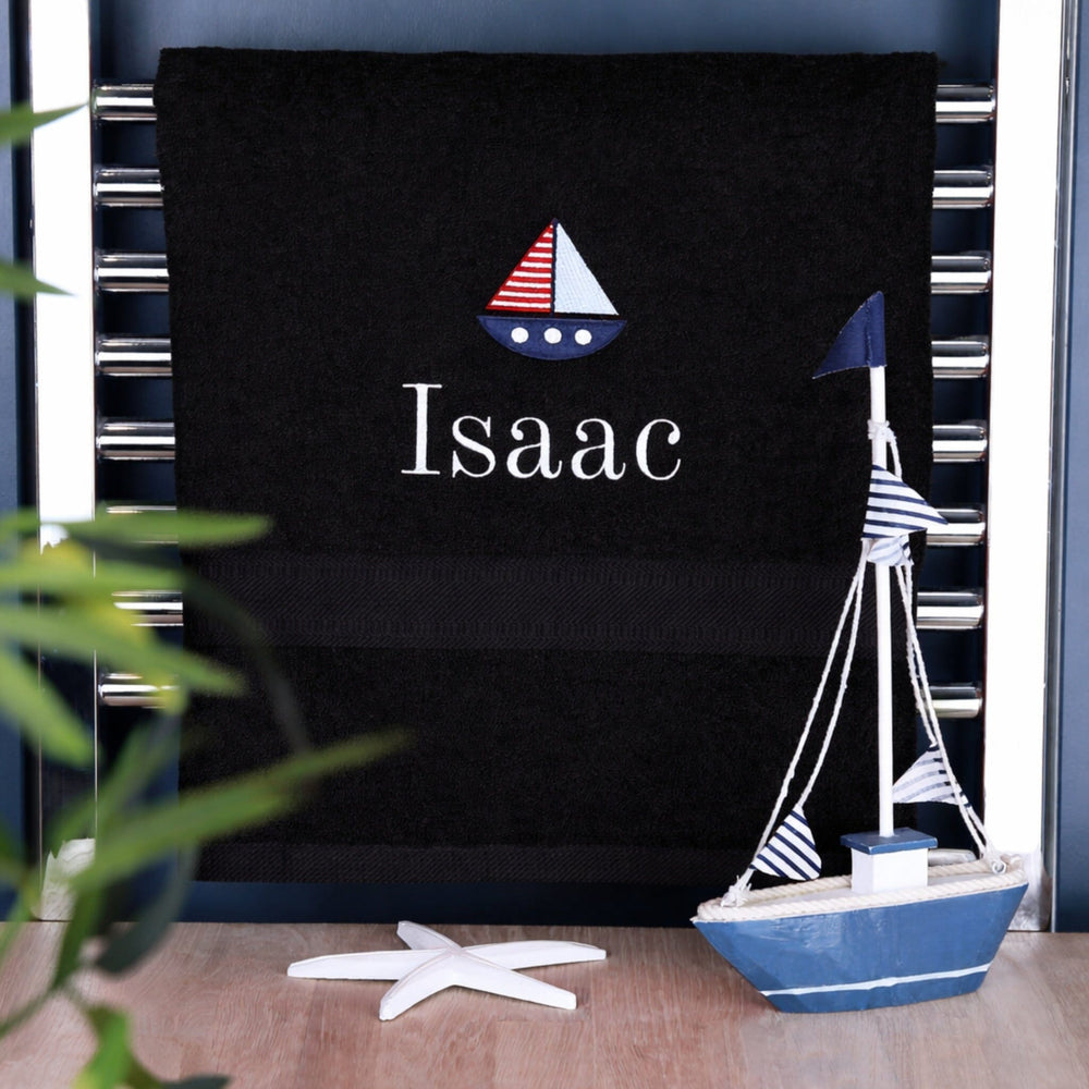boys name on black bath towel