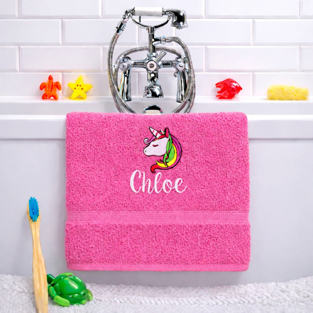 name on pink bath towel