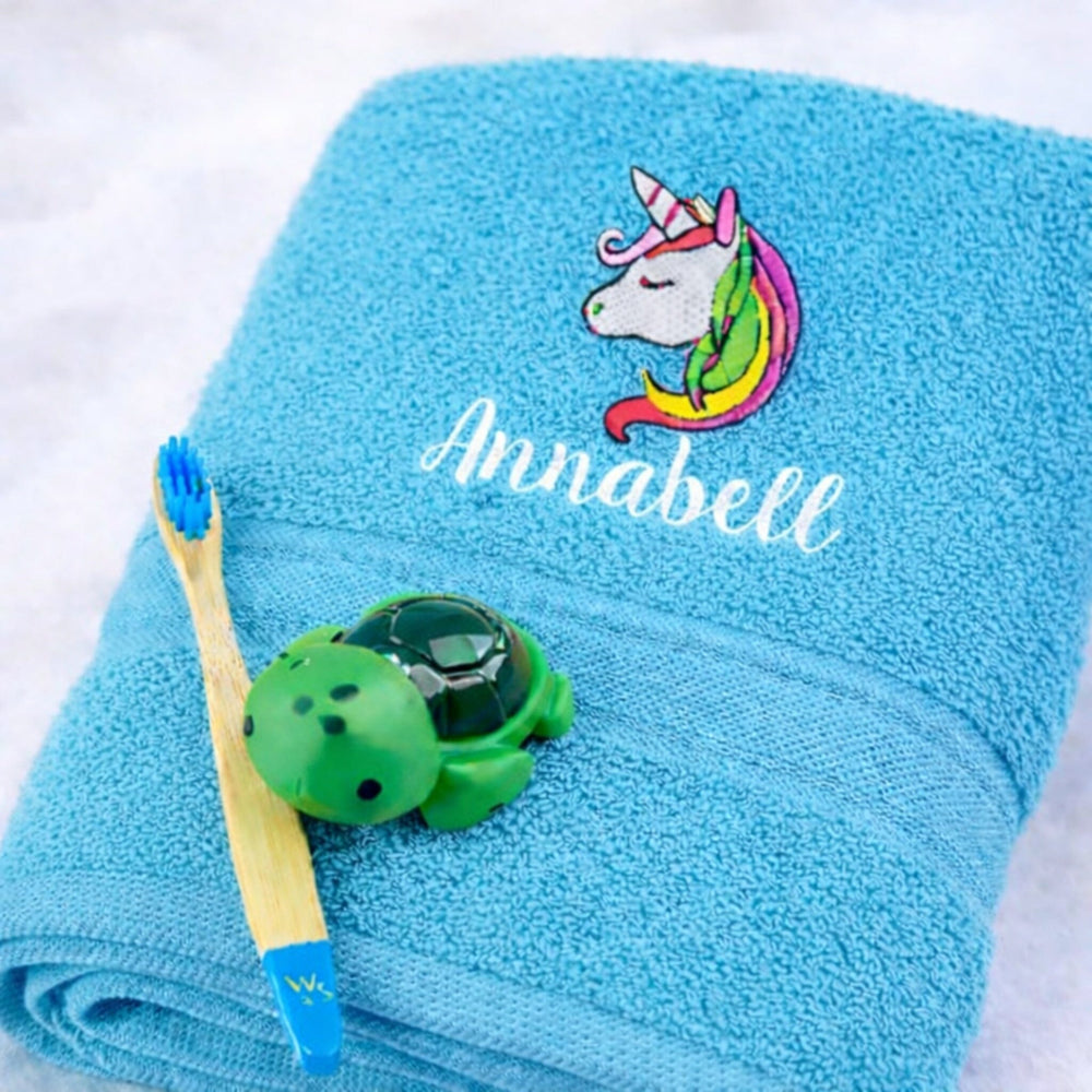 name on turquoise bath towel