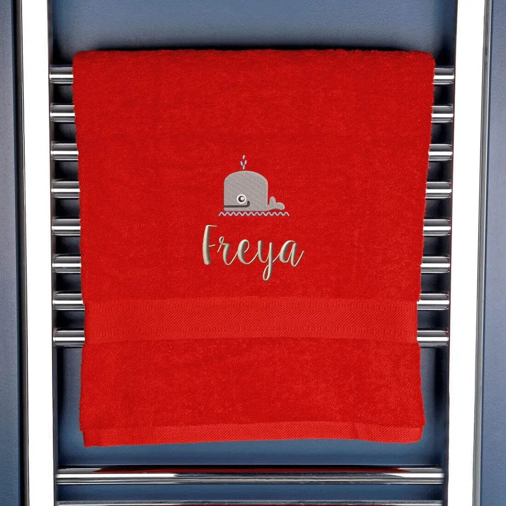 kids towel in red with a whale design and personalised name