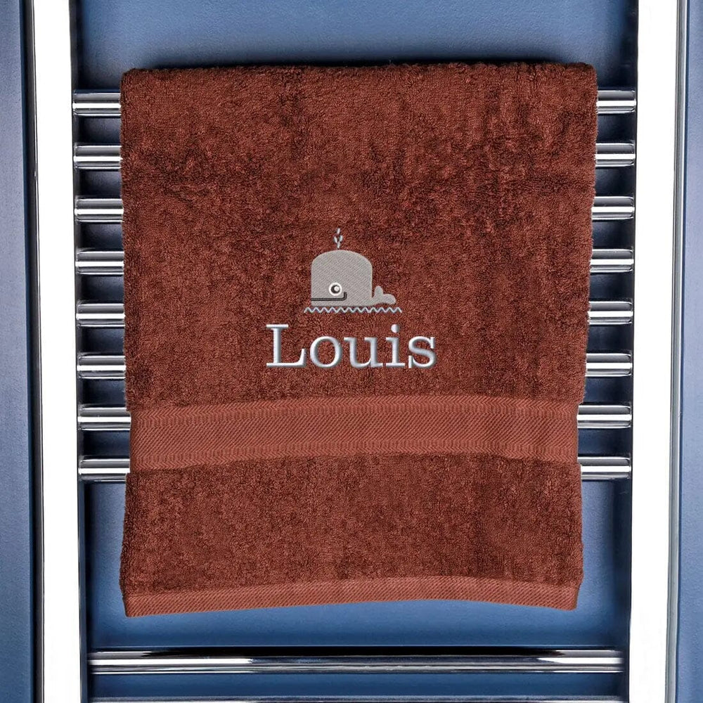 chocolate brown towel with whale and name