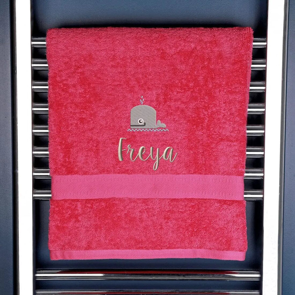 fuschia pink bath towel with embroidered whale and name
