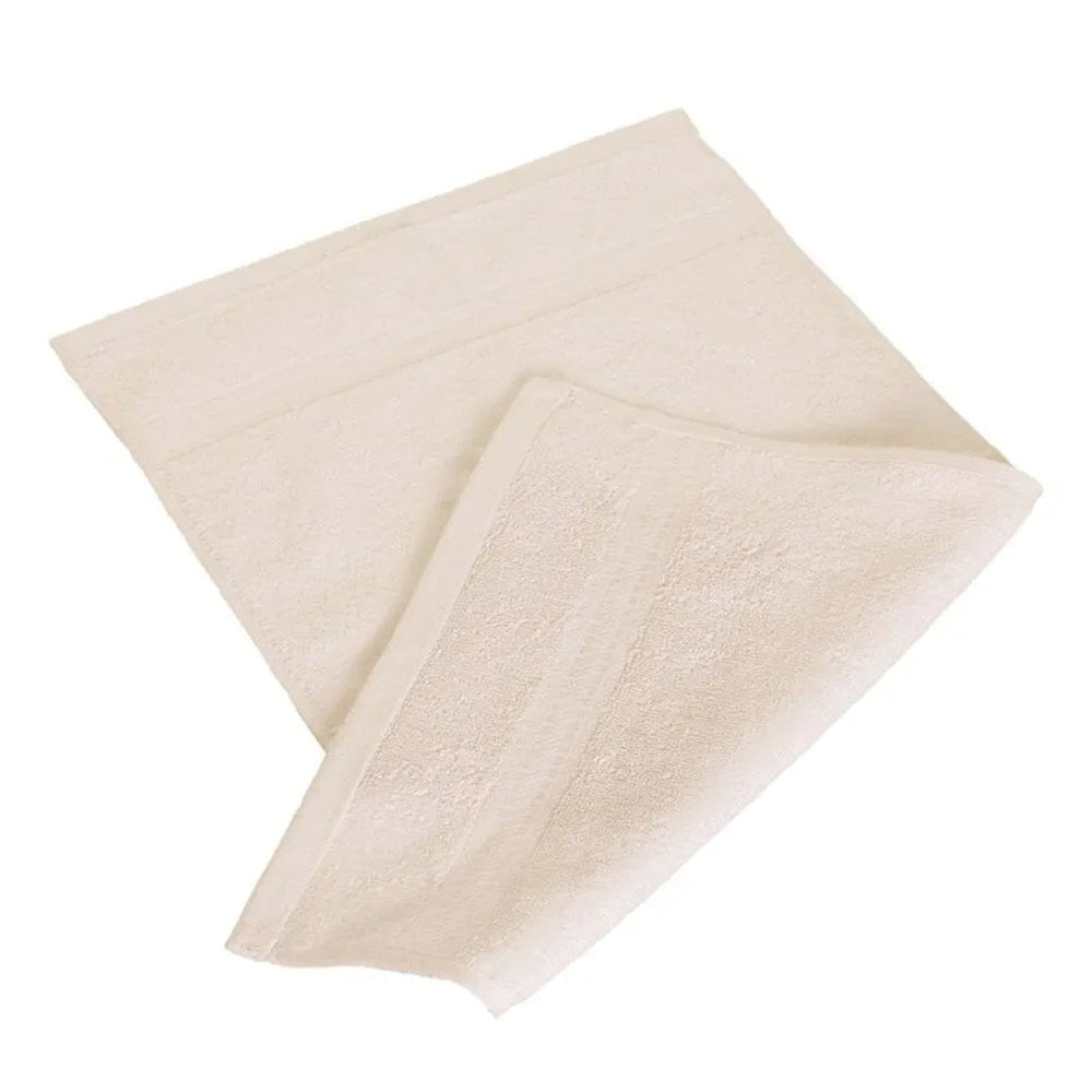 Vanilla egyptian cotton 550gsm manicure guest towel on white background