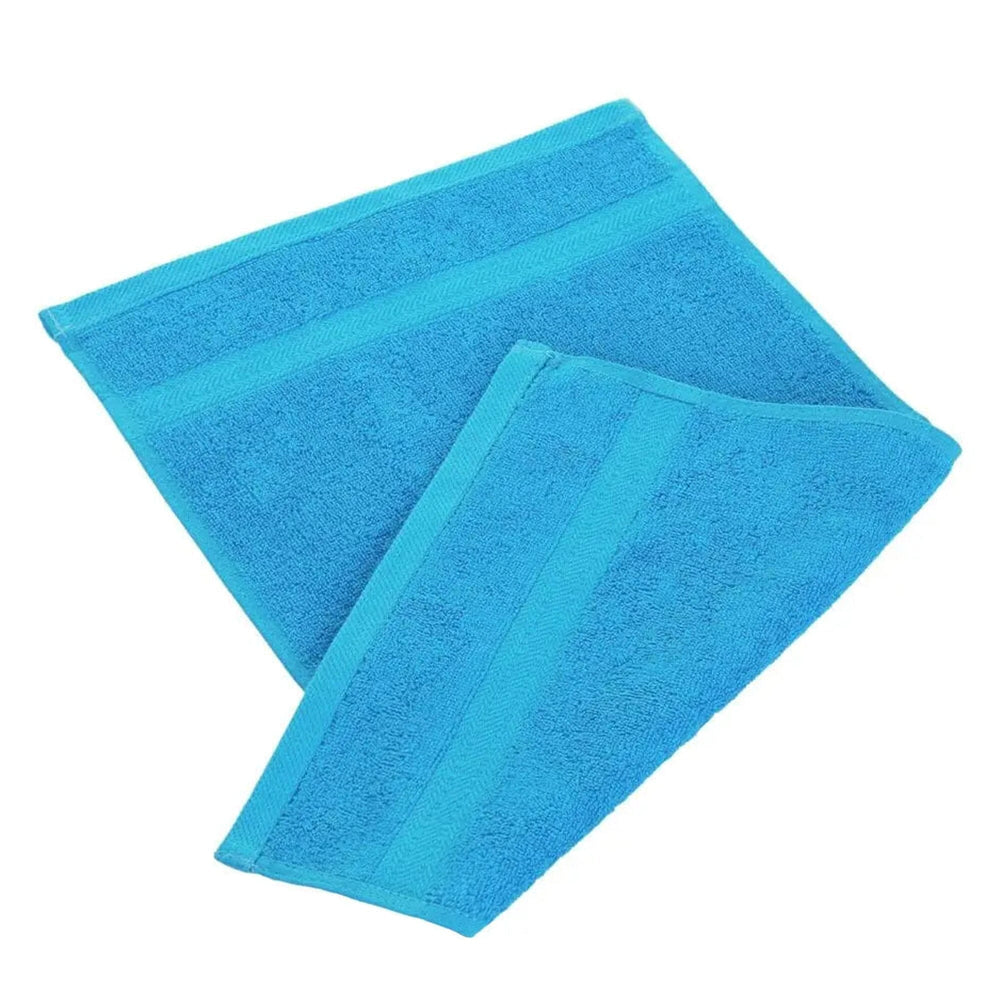 Turquoise egyptian cotton 550gsm manicure guest towel on white background