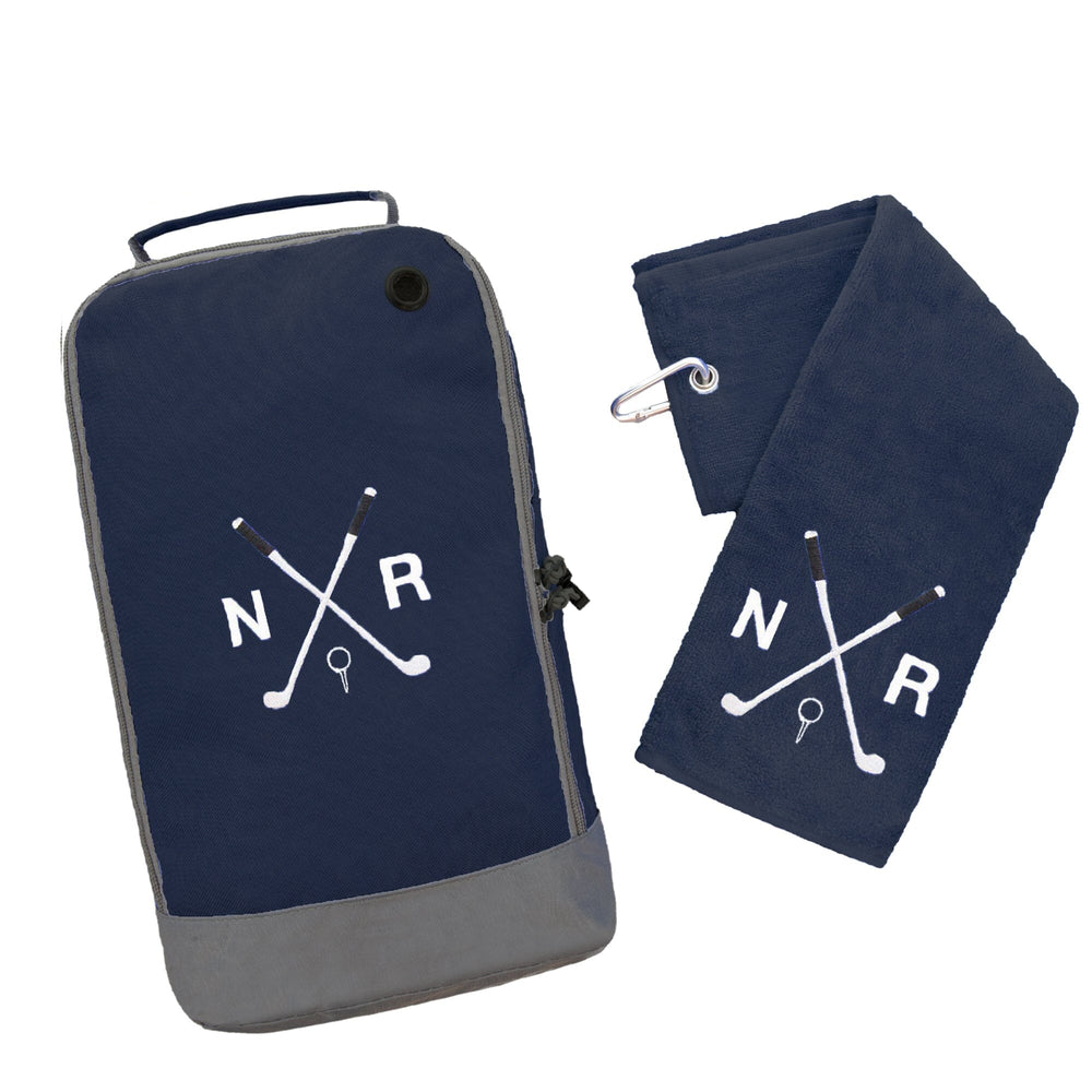 Navy blue golf bag and towel with 'NR' logo on a white background