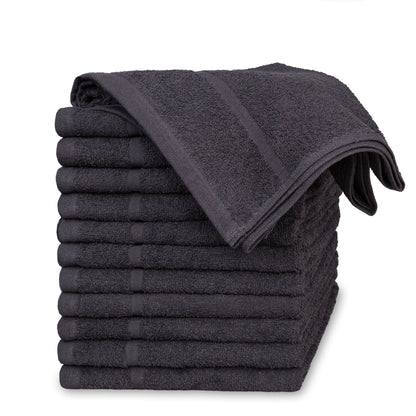 A stack of black hair dressing towels white background
