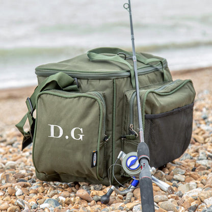 personalised insulated fishing holdall on the beach