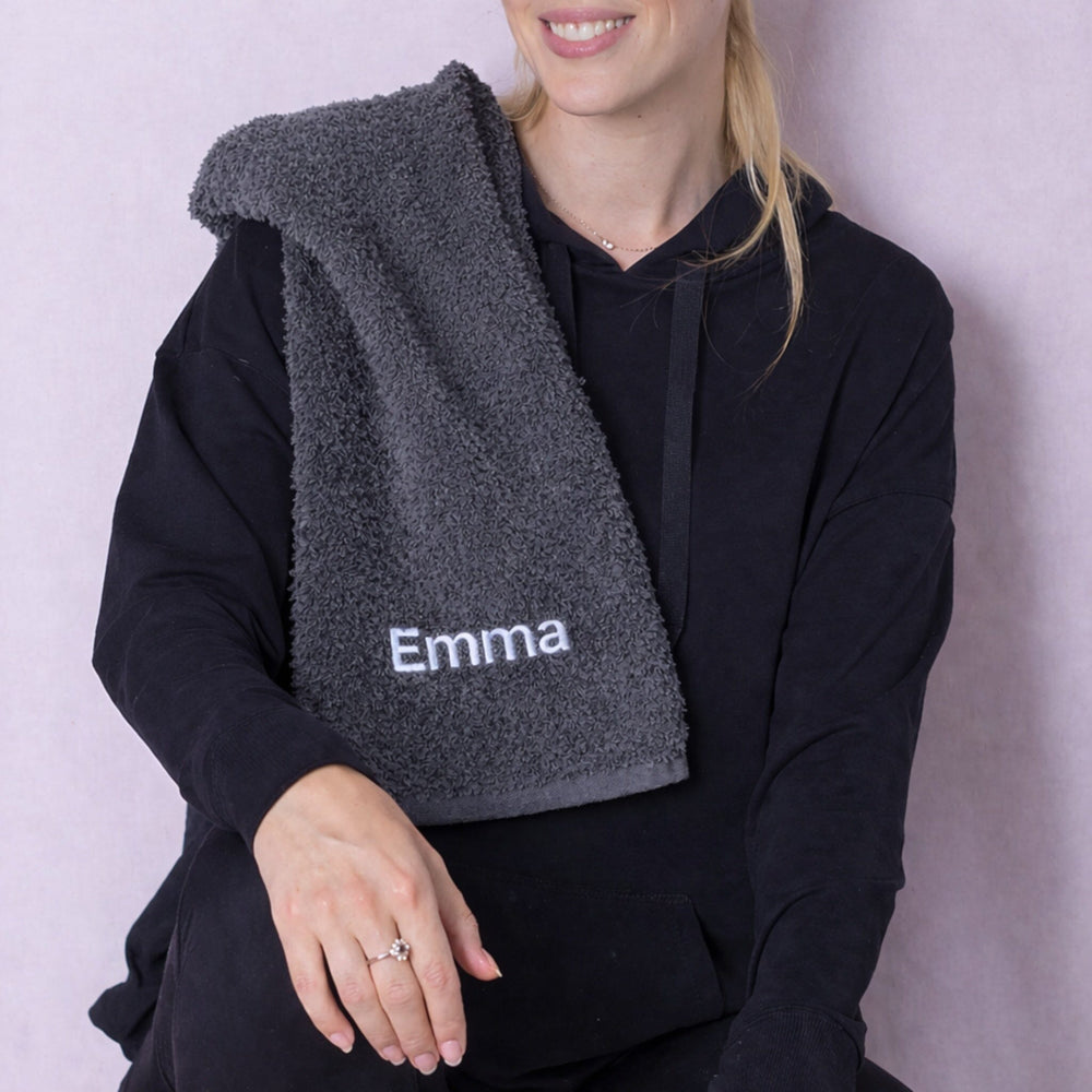 name on grey gym towel
