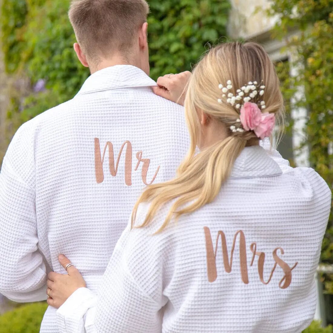 Back on view of the gown worn by a couple