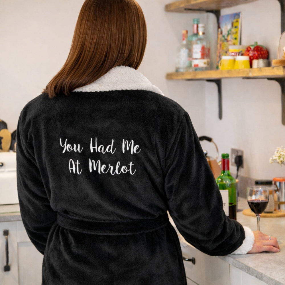 White text on black dressing gown