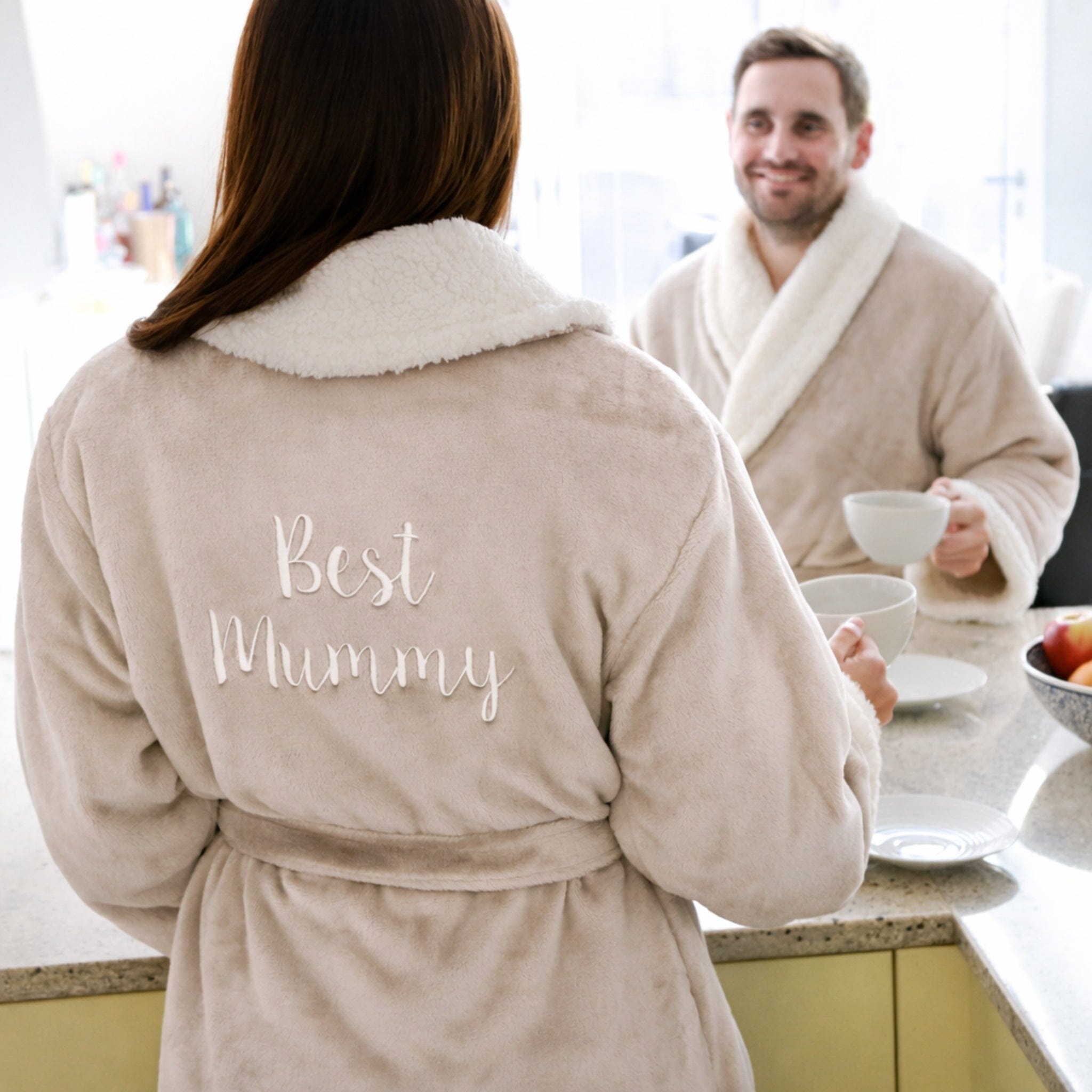 White text on taupe dressing gown