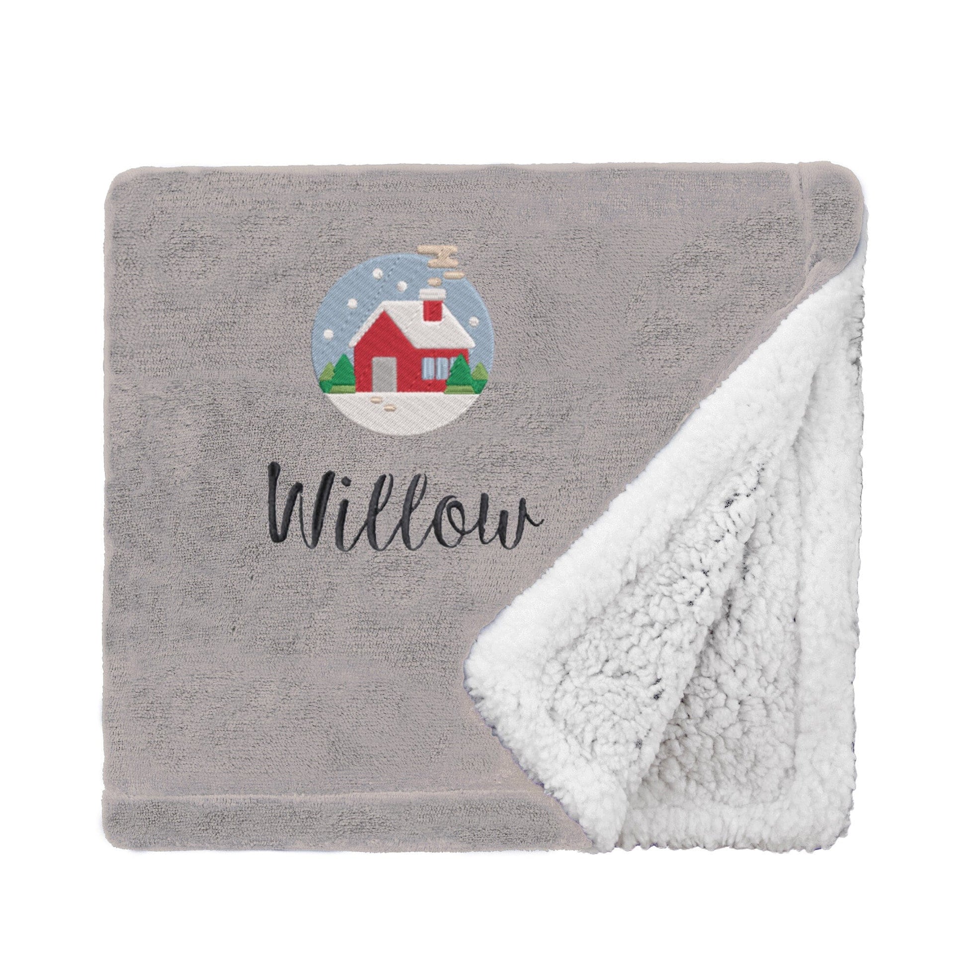 Taupe Personalised Cosy Christmas Mini Sherpa Blanket With Embroidered Festive Cottage Design On White Backdrop