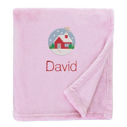 Pink Personalised Cosy Christmas So Soft Blanket With Embroidered Festive Cottage Design On White Backdrop