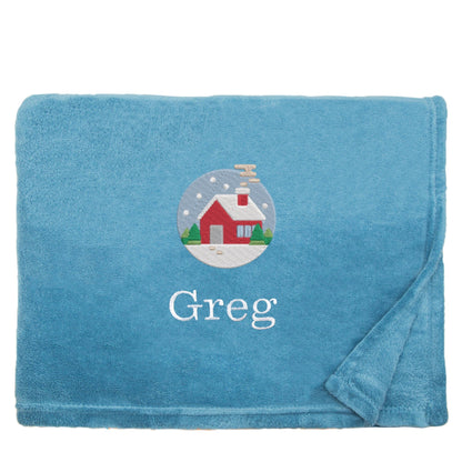 Petrol Blue Personalised Cosy Christmas Snuggle Touch Blanket With Embroidered Festive Cottage Design On White Backdrop