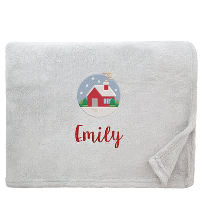 Silver Personalised Cosy Christmas Snuggle Touch Blanket With Embroidered Festive Cottage Design On White Backdrop