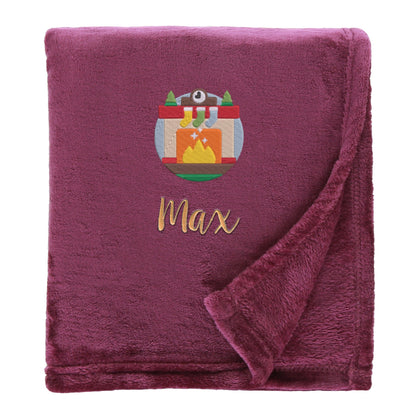 Plum Personalised Cosy Christmas So Soft Blanket With Embroidered Winter Fireplace Design On White Backdrop