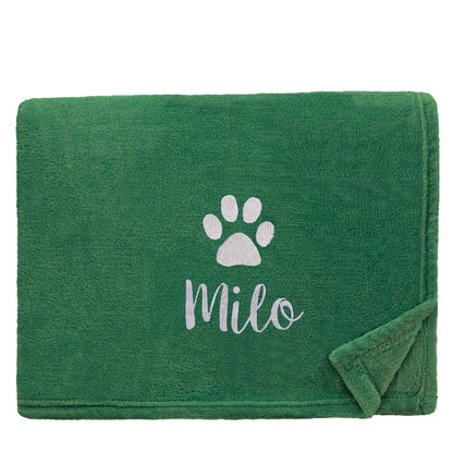 Forest Dog Throw with a pawprint design and personalisation of 'Milo'