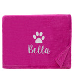 Magenta Dog Throw with a pawprint design and personalisation of 'Bella'