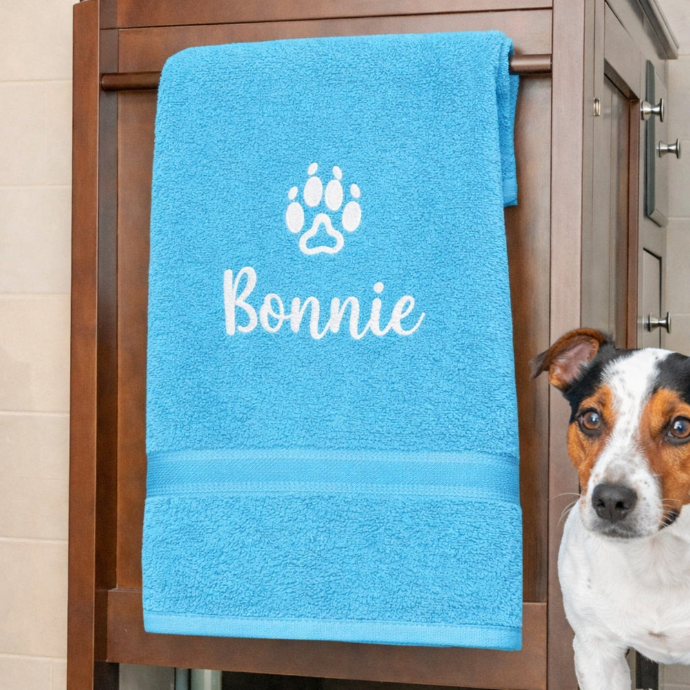 dog name on turquoise towel