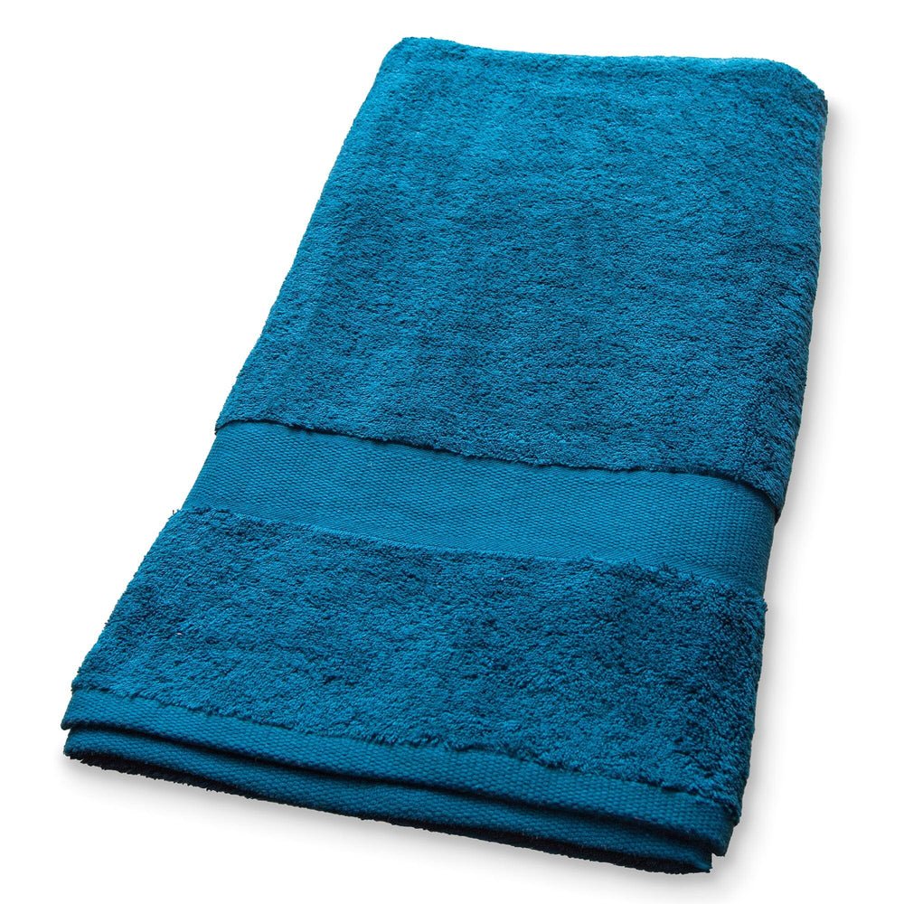 Peacock coloured towel on a white background