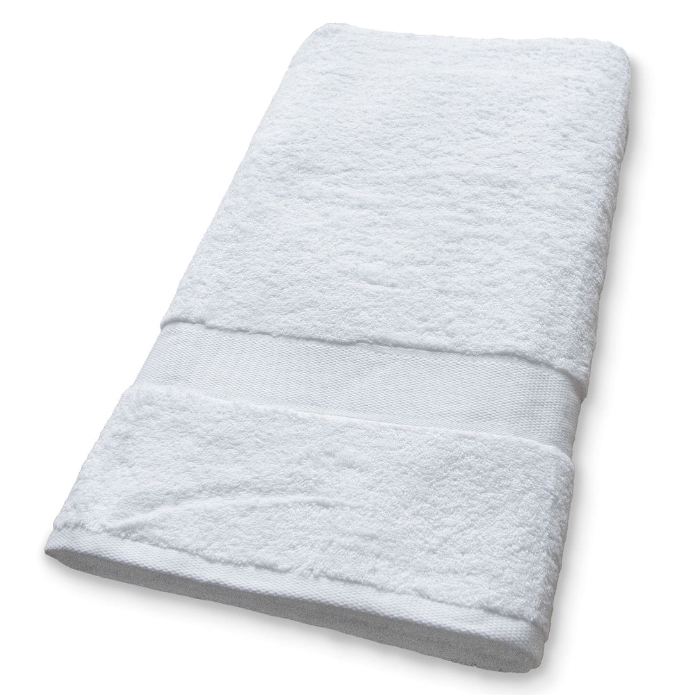 White coloured towel on a white background