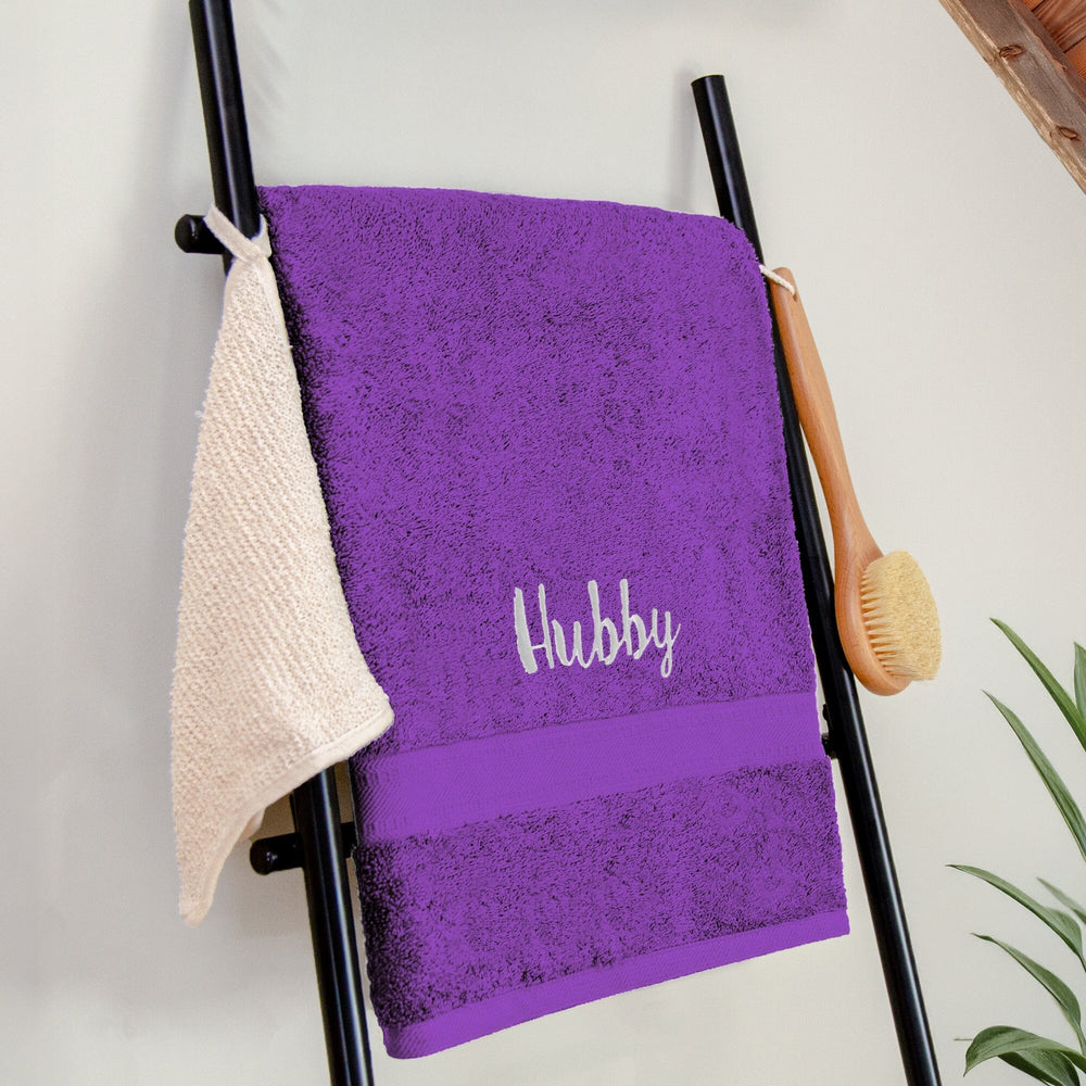 Name on a purple bath sheet