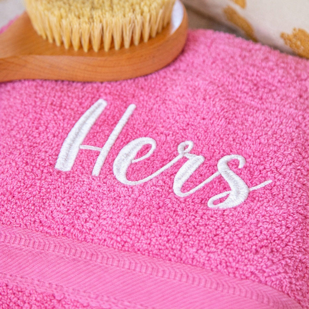 White thread on pink towel