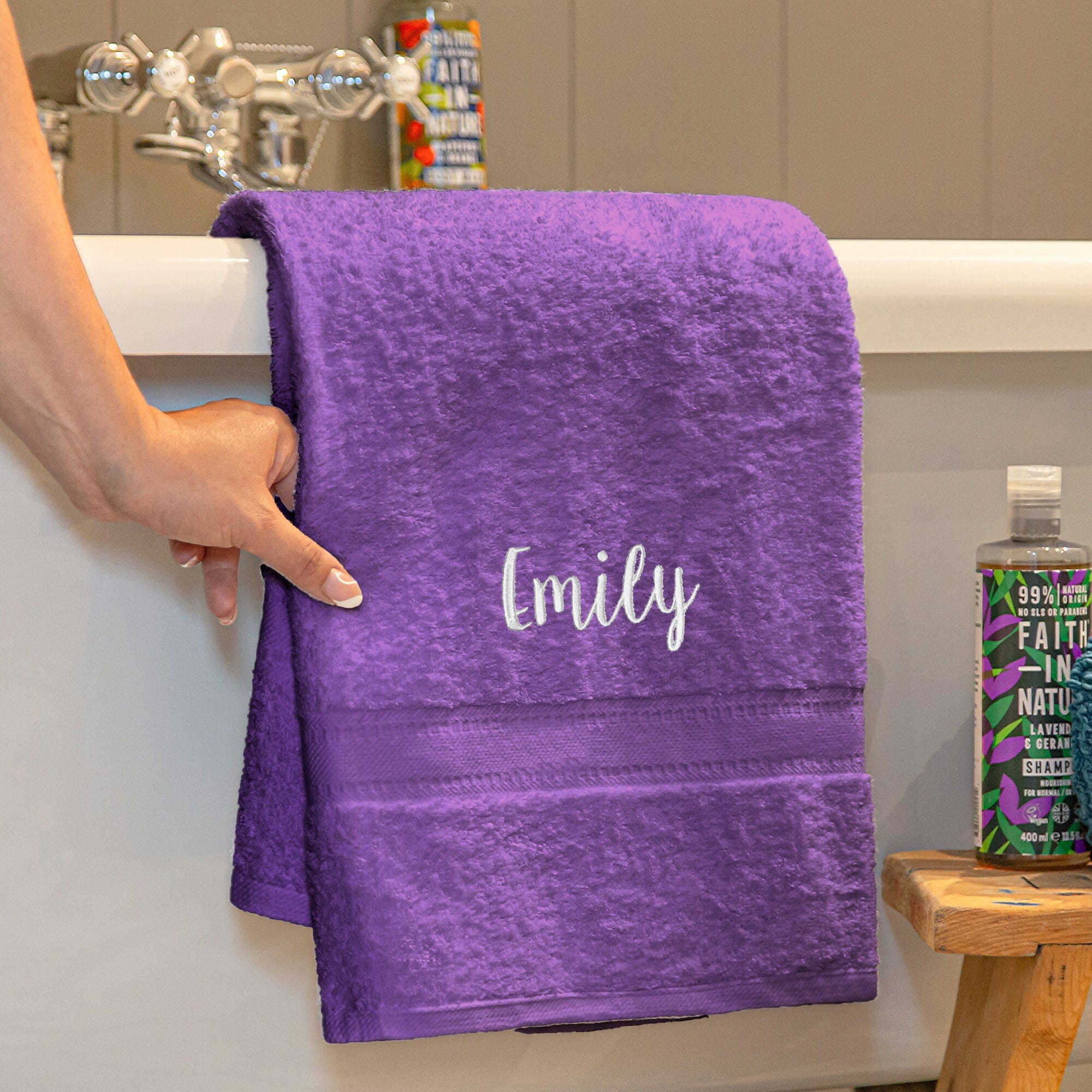Name on a purple bath towel