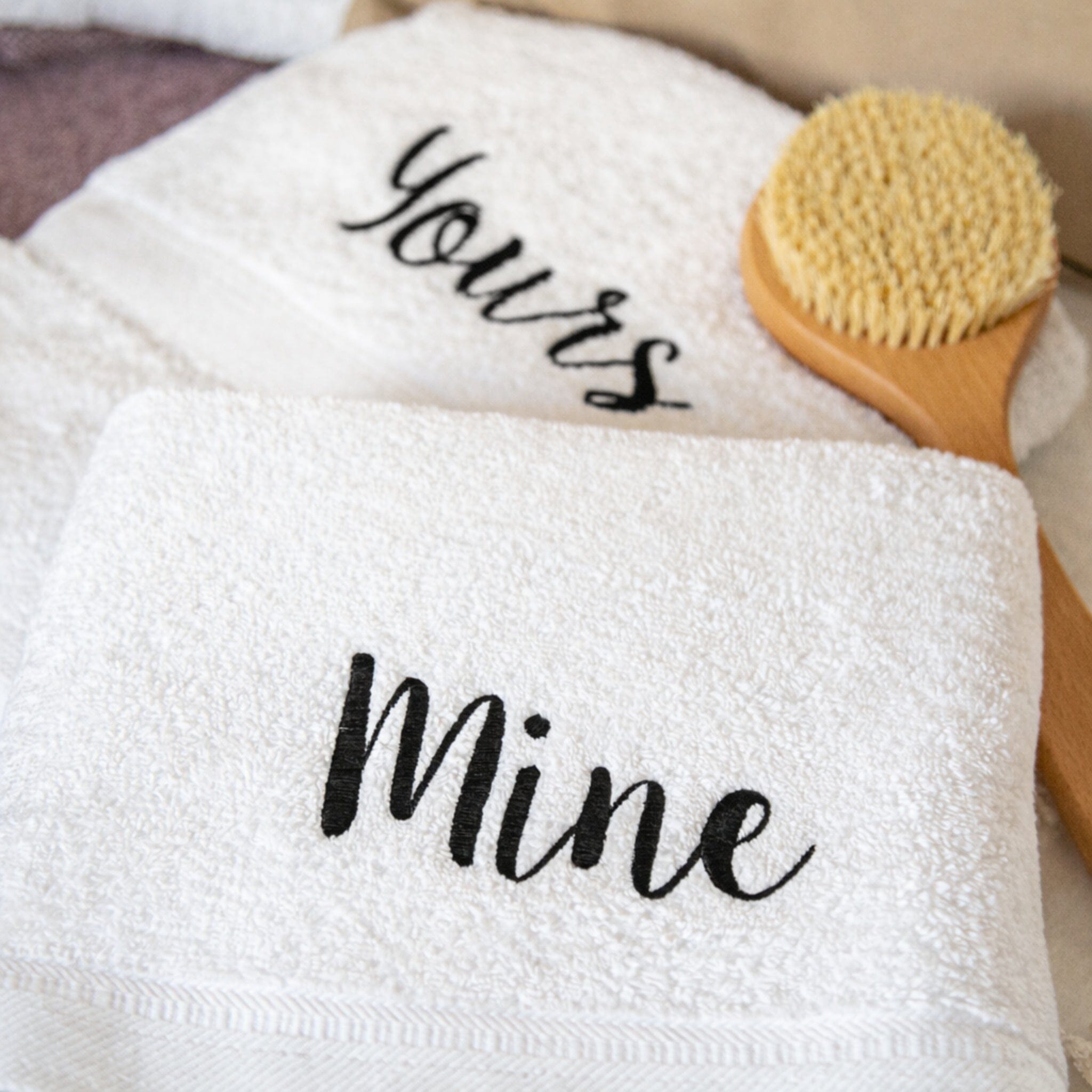 black thread on white bath towels