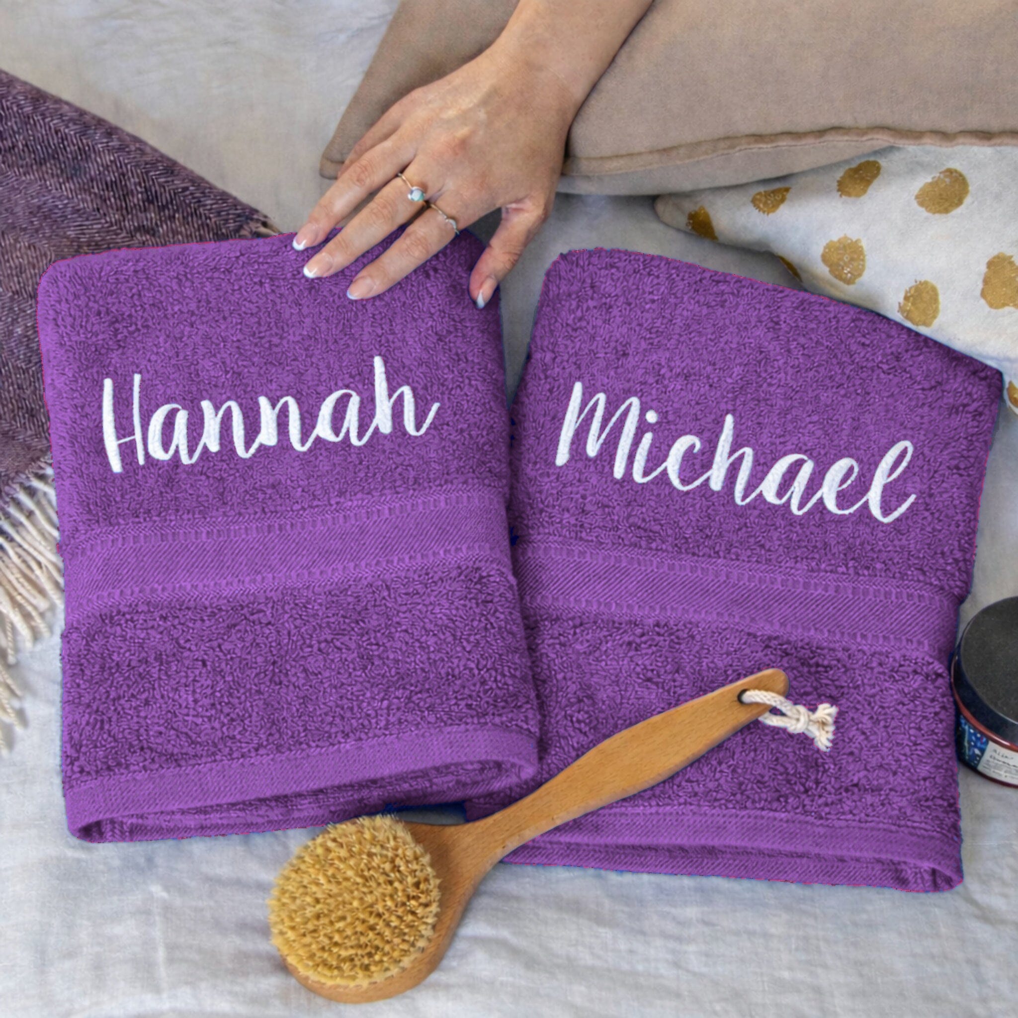 white thread on purple towels