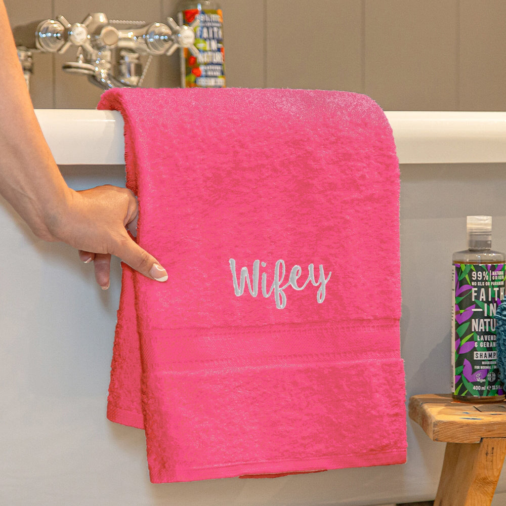 Name on a pink bath towel