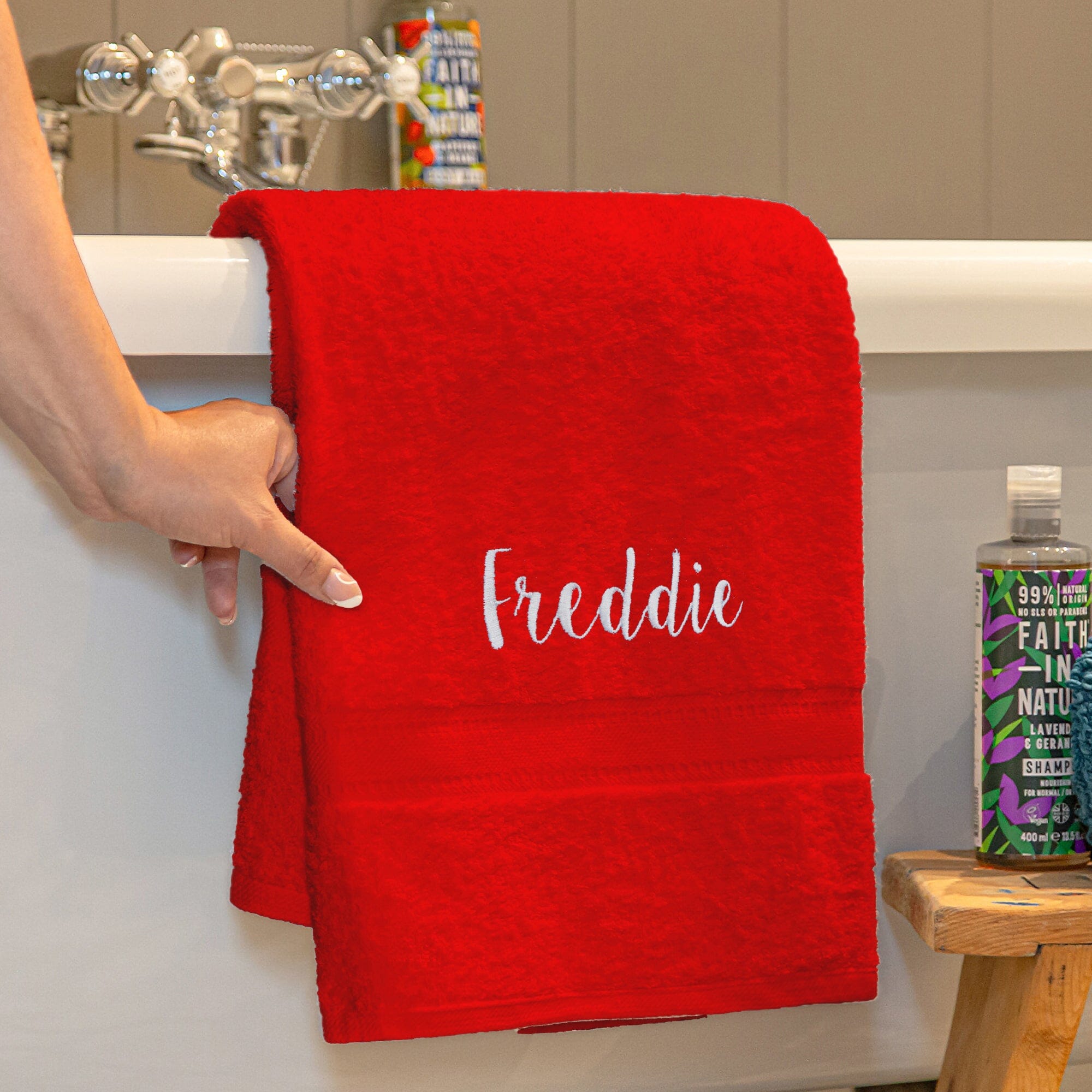 Name on a red bath towel
