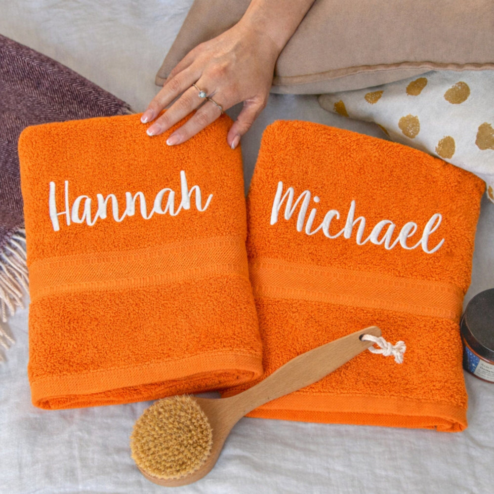 white text on orange towels