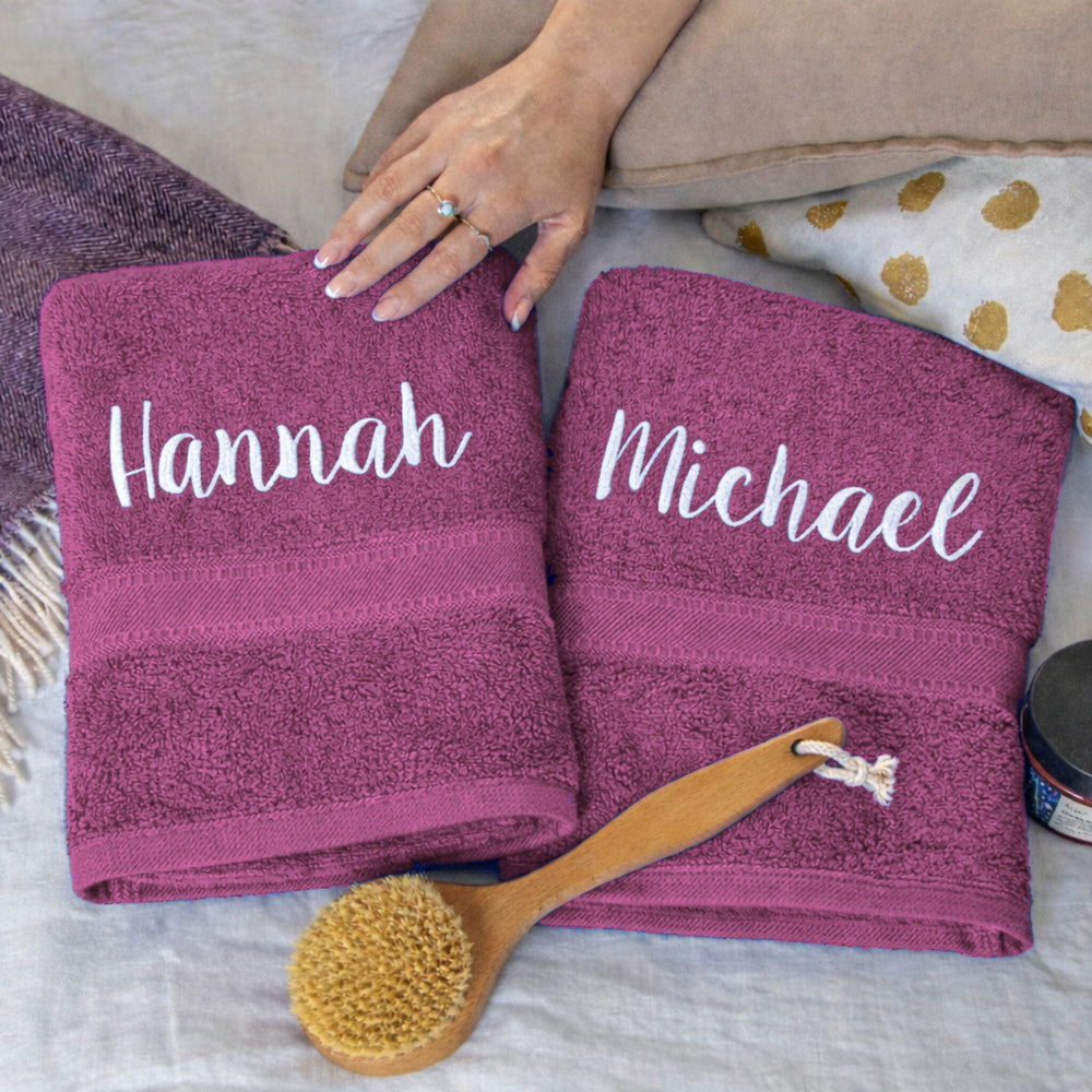 white thread on aubergine towels