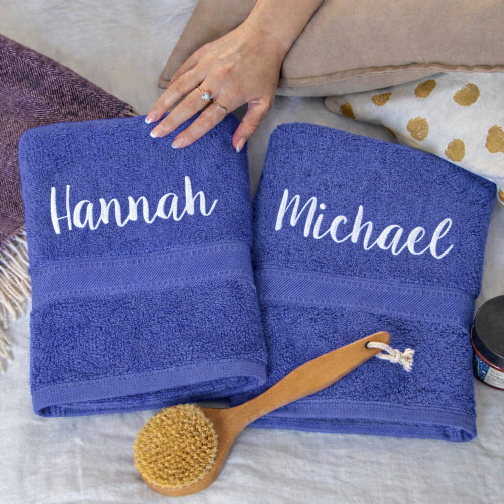 white thread on navy blue towels