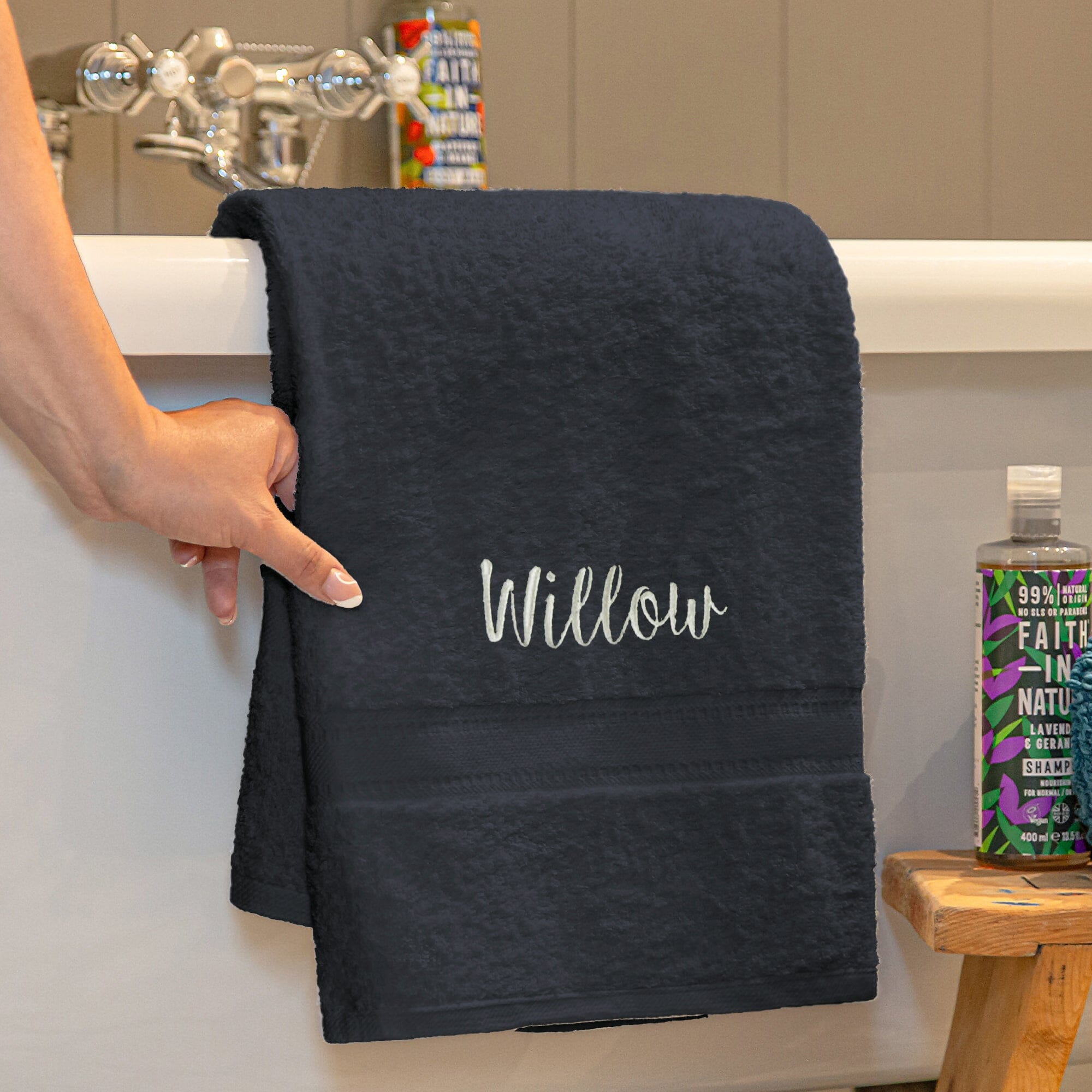 Name on a black bath towel