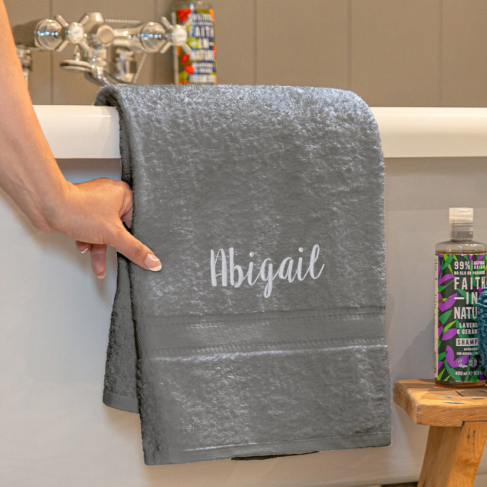 Name on a grey bath towel