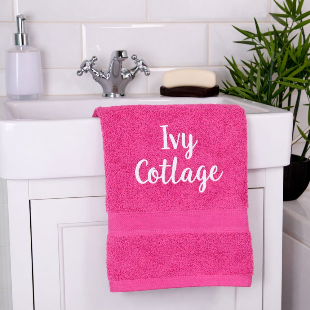 name on pink hand towel